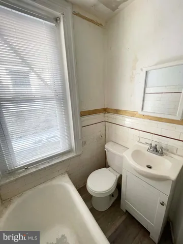 a bathroom with a sink and a toilet
