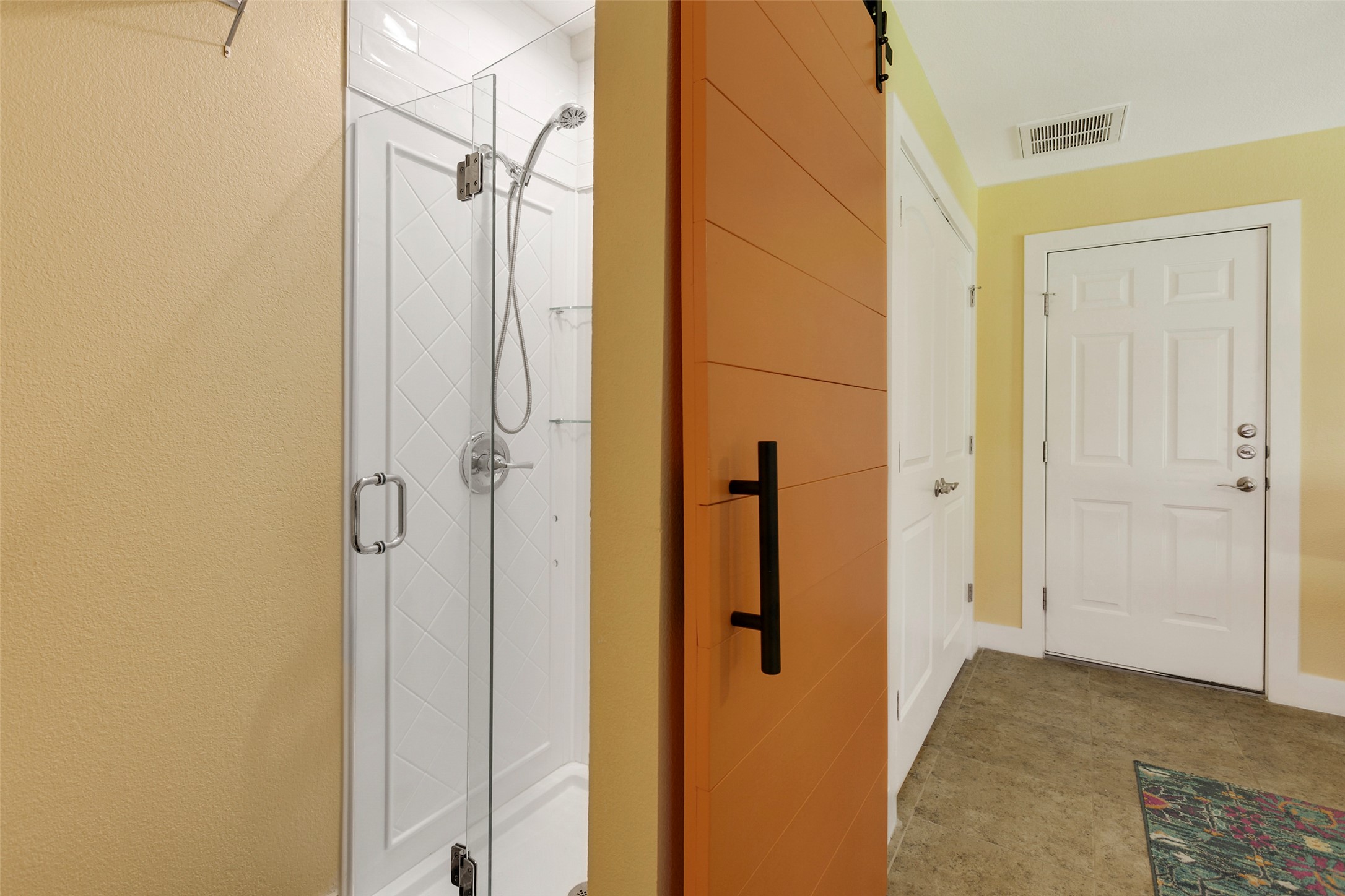 13420 Lyndhurst Street, Unit 308 Austin, TX 78717 - Photo 11 of 25 Bathroom with a stall shower and baseboards