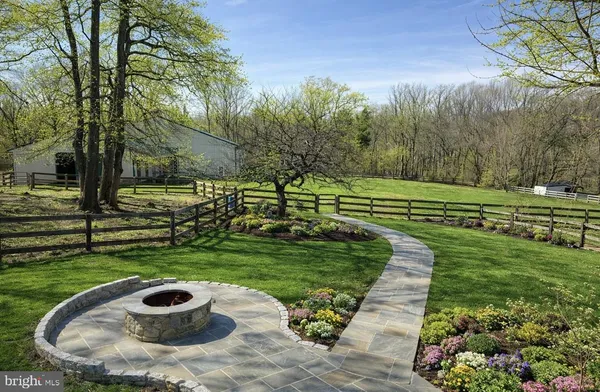 a view of a garden with a fountain