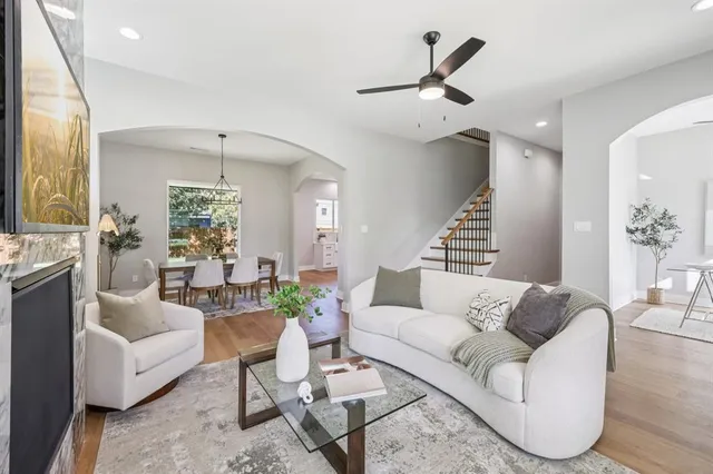 a kitchen with white cabinets stainless steel appliances and sink