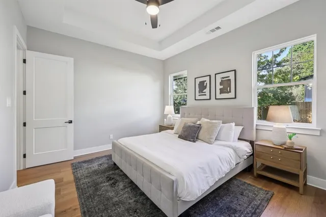 a bathroom with a bathtub and shower