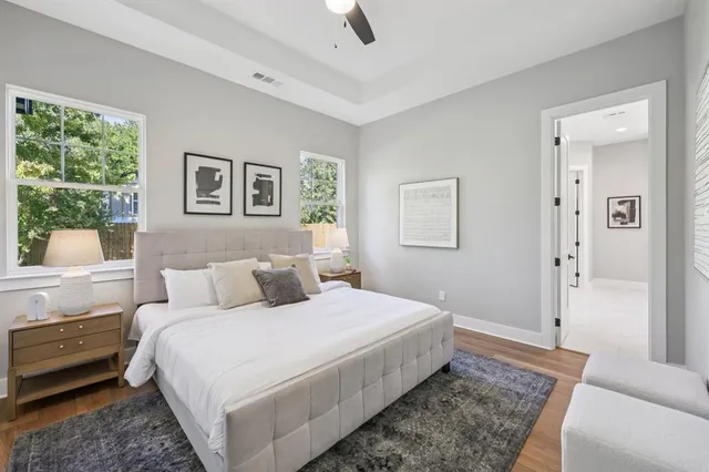 a bathroom with double vanity sink and a mirror