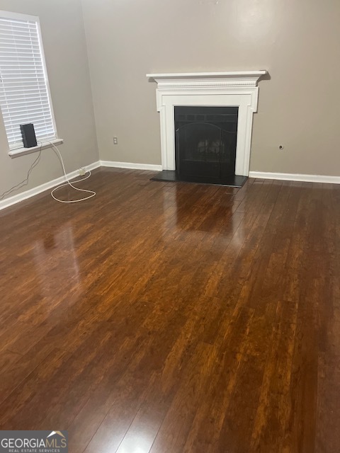 2635 Ashley Downs Lane South Fulton, GA 30349 - Photo 3 of 12 a view of empty room with a fireplace