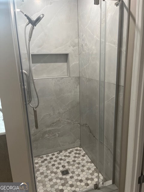 2635 Ashley Downs Lane South Fulton, GA 30349 - Photo 4 of 12 a bathroom with a shower