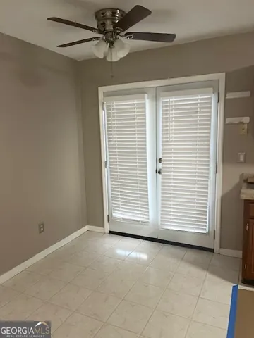 a view of a livingroom with a staircase