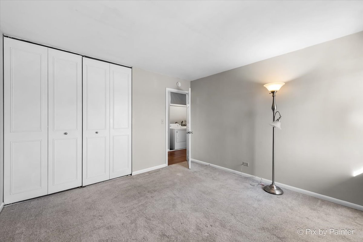 6207 Kit Carson Drive, Unit 6207 Hanover Park, IL 60133 - Photo 15 of 24 a view of an empty room