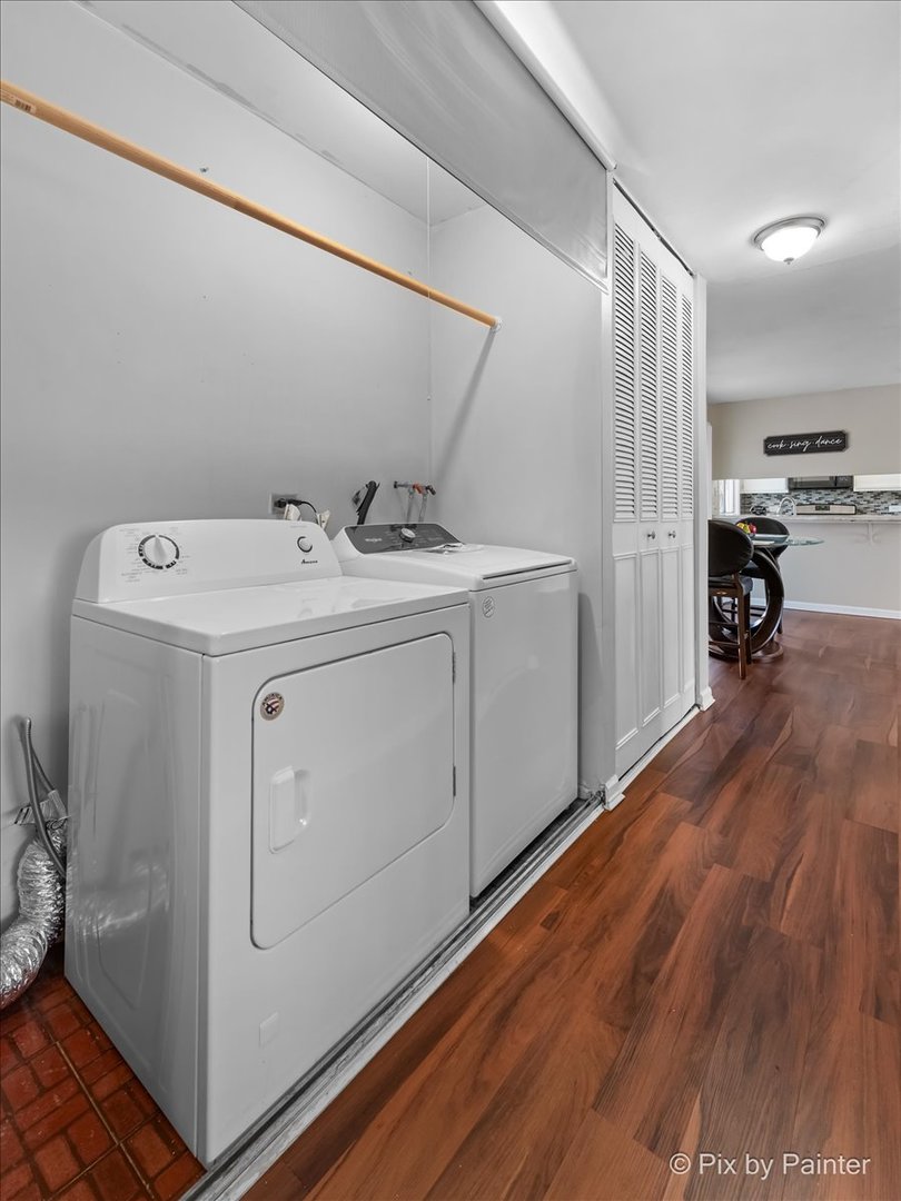6207 Kit Carson Drive, Unit 6207 Hanover Park, IL 60133 - Photo 10 of 24 a view of utility room with washer and dryer