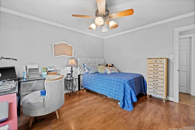 a bed room with a bed furniture and a window