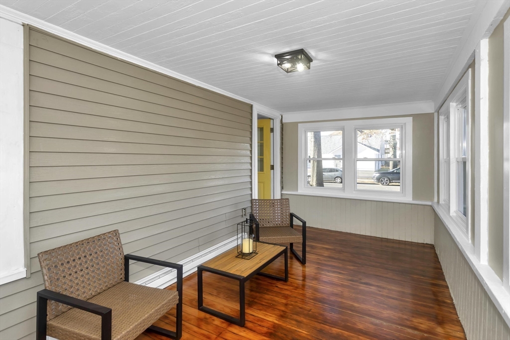 3 Norfolk Street Springfield, MA 01109 - Photo 14 of 42 a view of a livingroom with lounge chair and a window