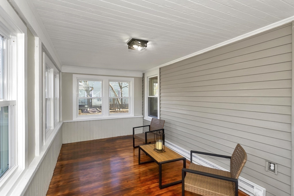 3 Norfolk Street Springfield, MA 01109 - Photo 15 of 42 a view of a livingroom with lounge chair and a window