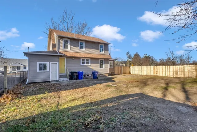 a view of a yard in front of a house