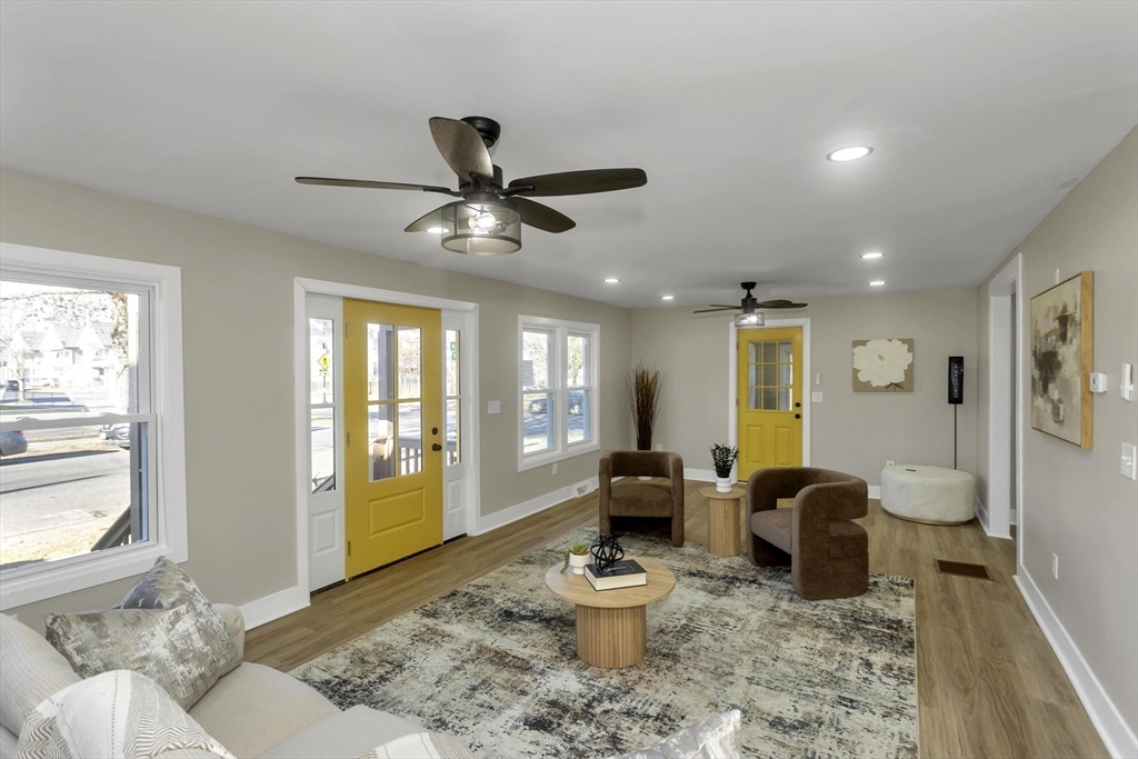 3 Norfolk Street Springfield, MA 01109 - Photo 5 of 42 a living room with furniture and a large window