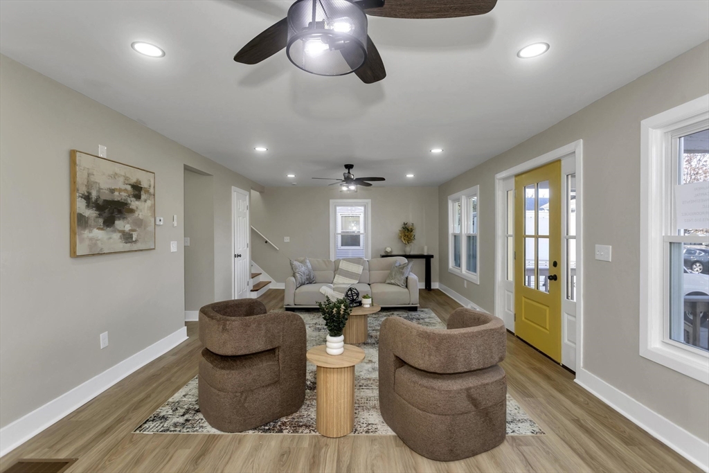 3 Norfolk Street Springfield, MA 01109 - Photo 8 of 42 a living room with furniture and a large window