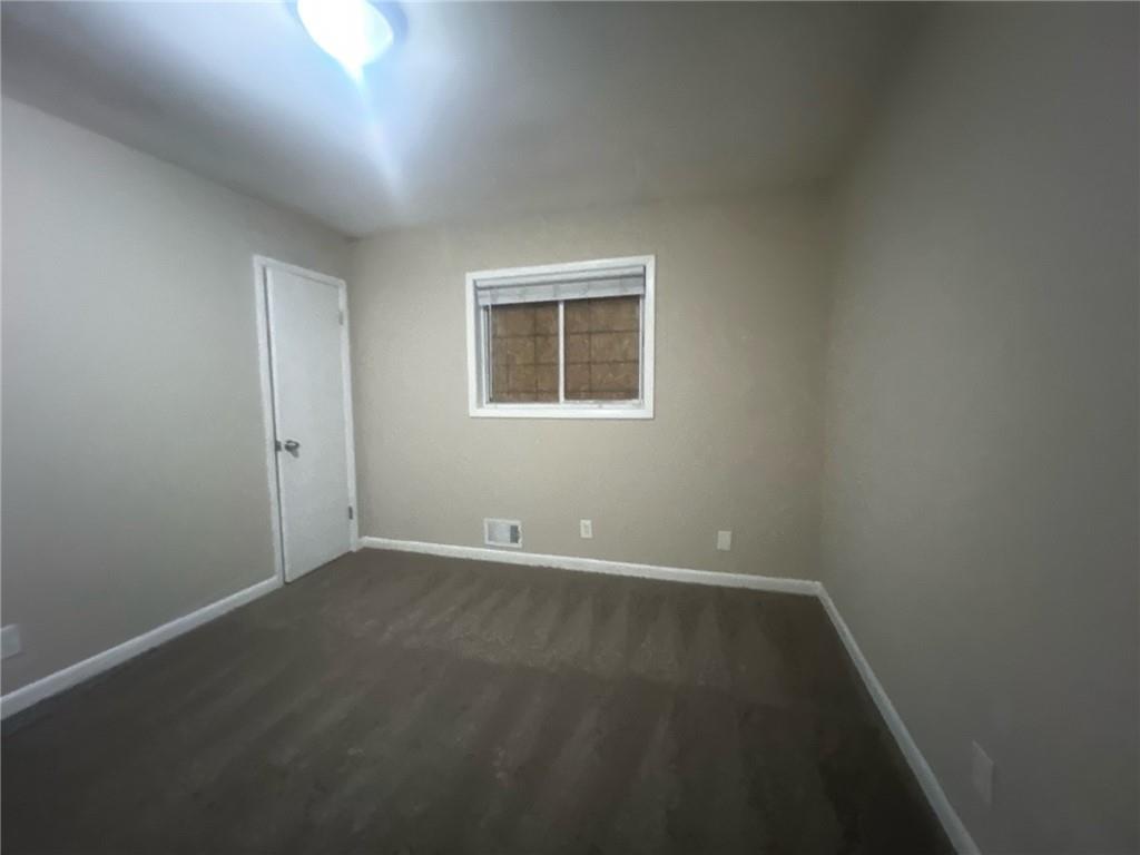 2785 Battle Forrest Drive Decatur, GA 30034 - Photo 8 of 16 an empty room with a window