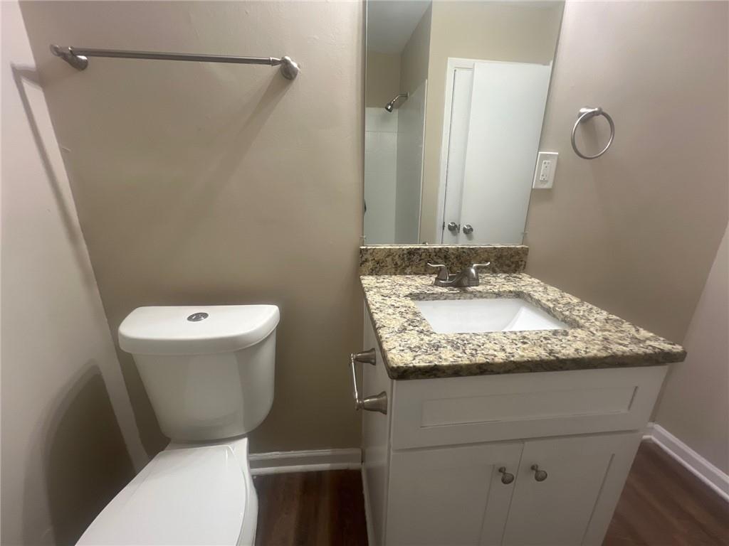 2785 Battle Forrest Drive Decatur, GA 30034 - Photo 9 of 16 a bathroom with a granite countertop sink toilet and shower