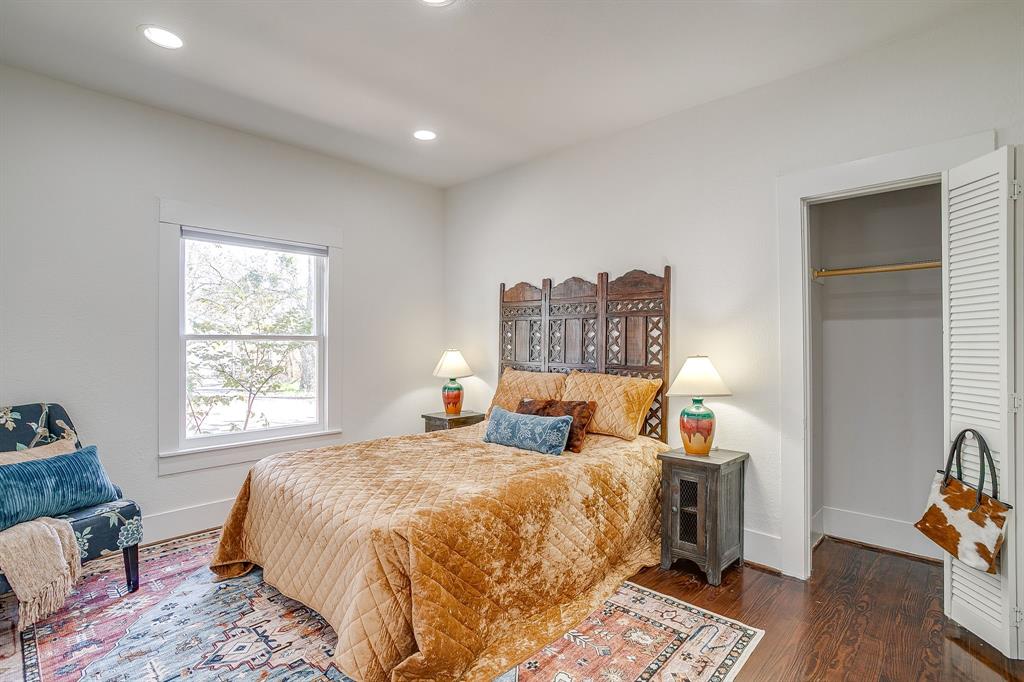 116 East Akard Street Weatherford, TX 76086 - Photo 12 of 32 a spacious bedroom with a bed and a window