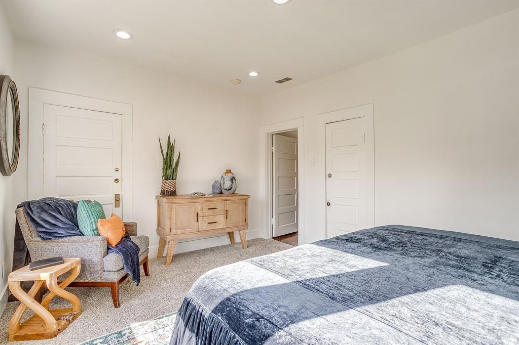 116 East Akard Street Weatherford, TX 76086 - Photo 16 of 32 a bedroom with a bed and furniture