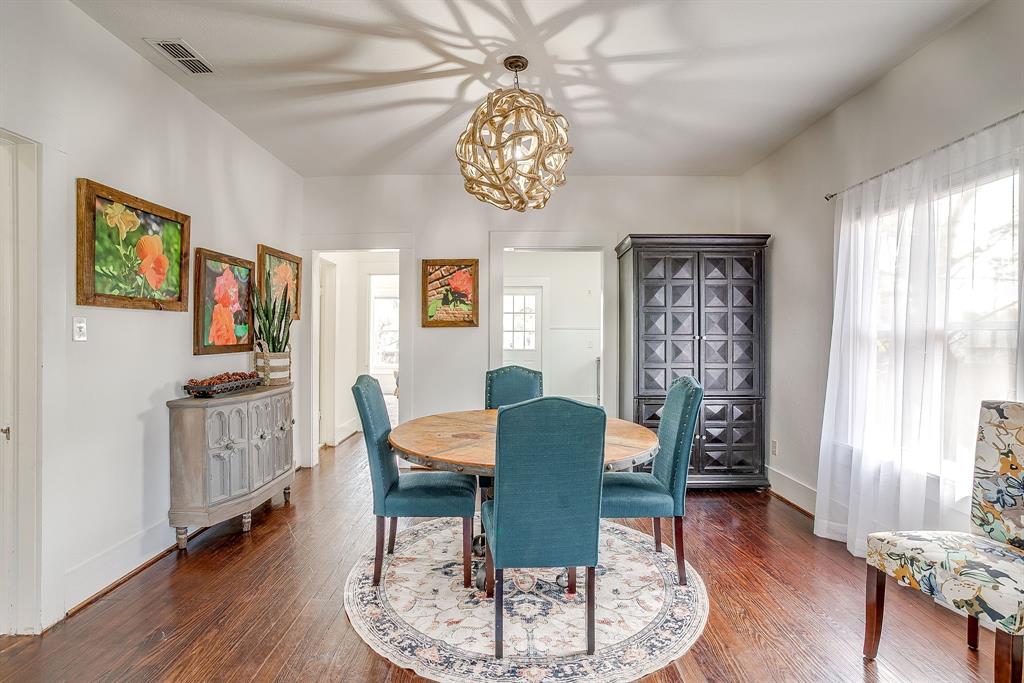 116 East Akard Street Weatherford, TX 76086 - Photo 7 of 32 a view of a dining room with furniture window and wooden floor