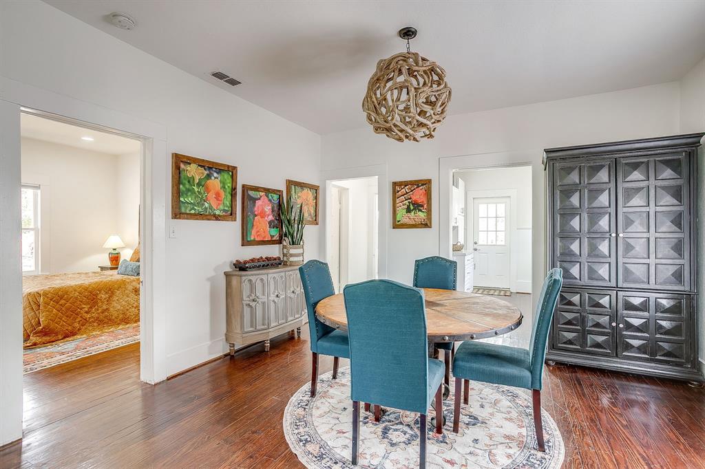 116 East Akard Street Weatherford, TX 76086 - Photo 8 of 32 a view of a dining room with furniture and wooden floor