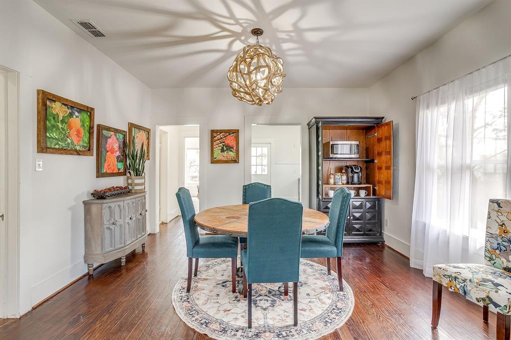 116 East Akard Street Weatherford, TX 76086 - Photo 9 of 32 a view of a dining room with furniture window and wooden floor