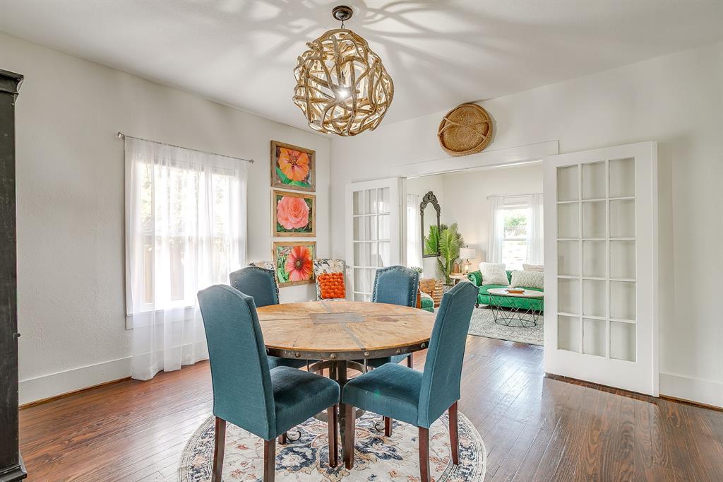 116 East Akard Street Weatherford, TX 76086 - Photo 10 of 32 a view of a dining room with furniture window and wooden floor