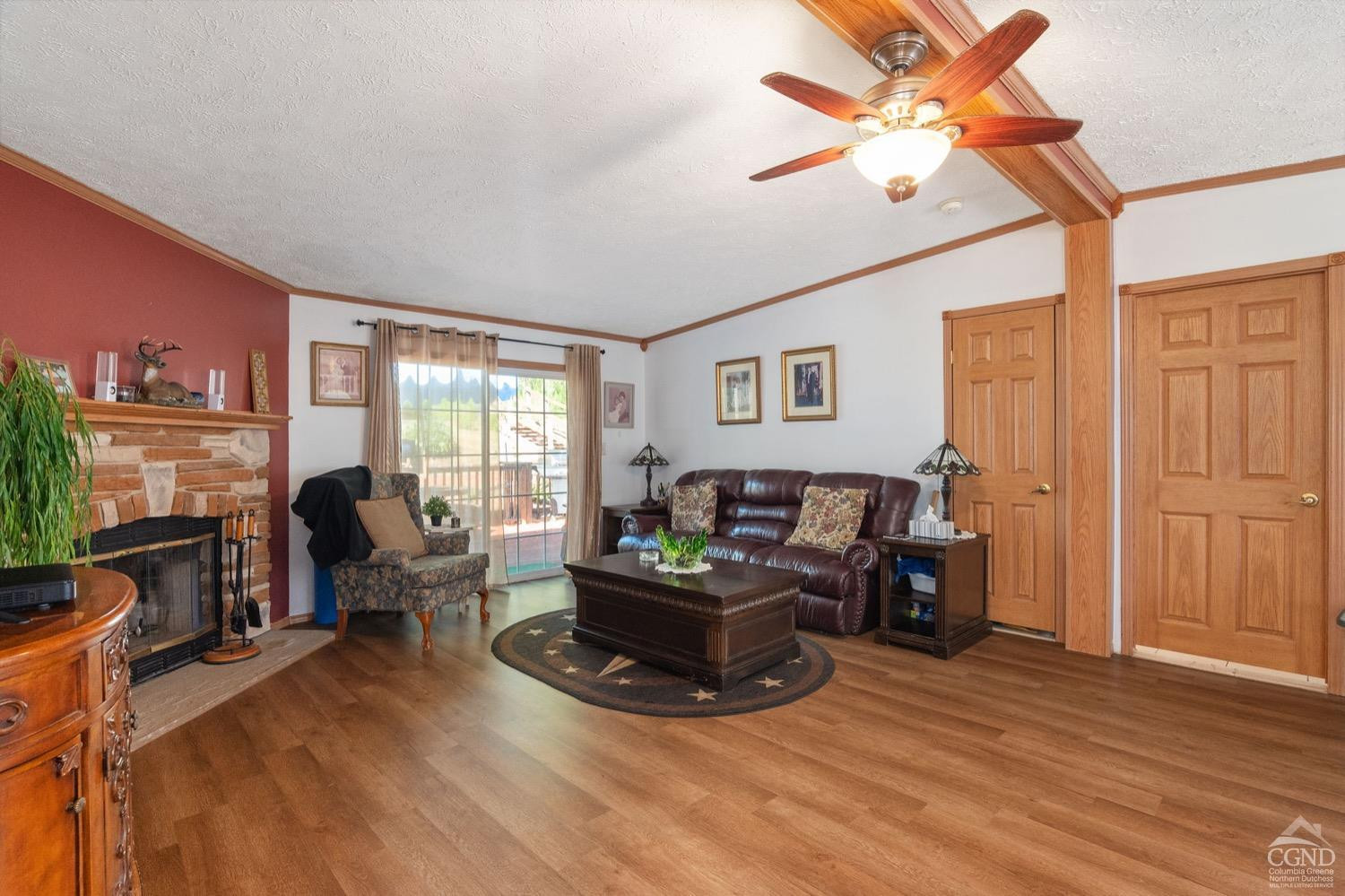 188 Taibbi Road Gilboa, NY 12076 - Photo 14 of 54 a living room with furniture window and wooden floor