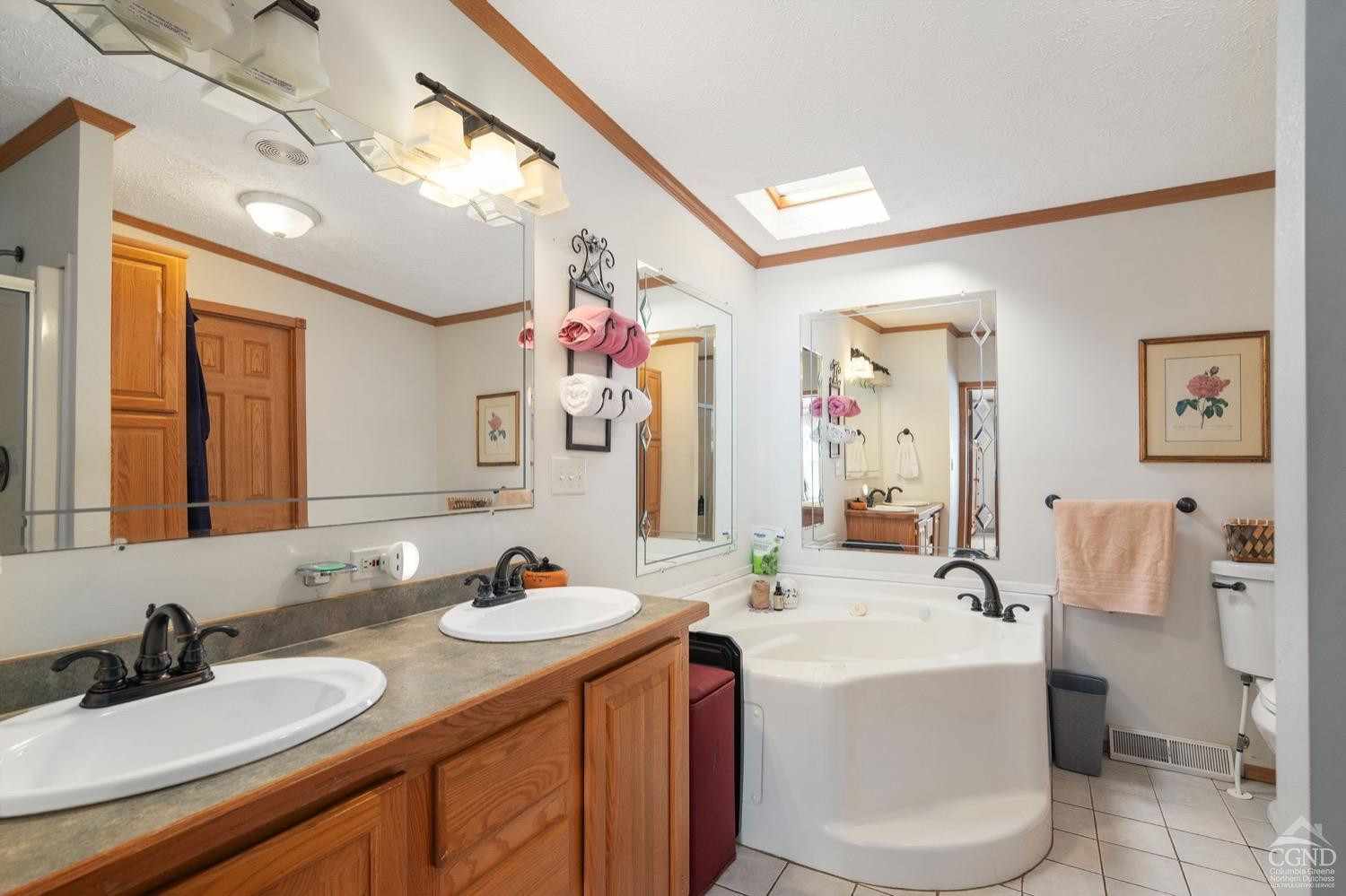 188 Taibbi Road Gilboa, NY 12076 - Photo 27 of 54 a bathroom with a double vanity sink mirror and toilet