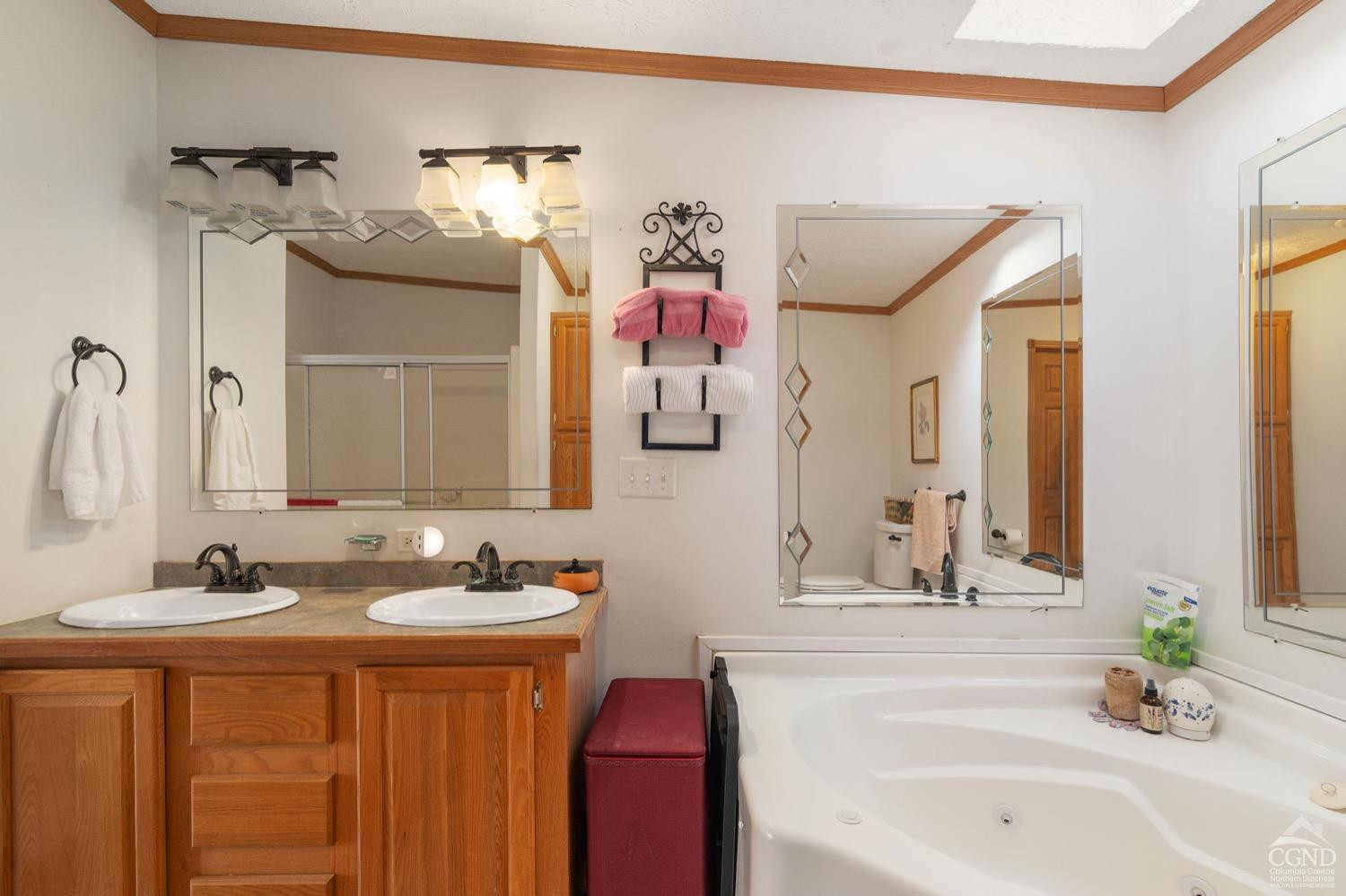 188 Taibbi Road Gilboa, NY 12076 - Photo 28 of 54 a bathroom with a double vanity sink mirror and bathtub