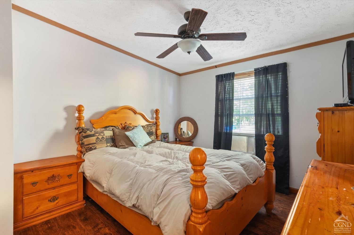 188 Taibbi Road Gilboa, NY 12076 - Photo 29 of 54 a bedroom with a bed and a dresser next to a window