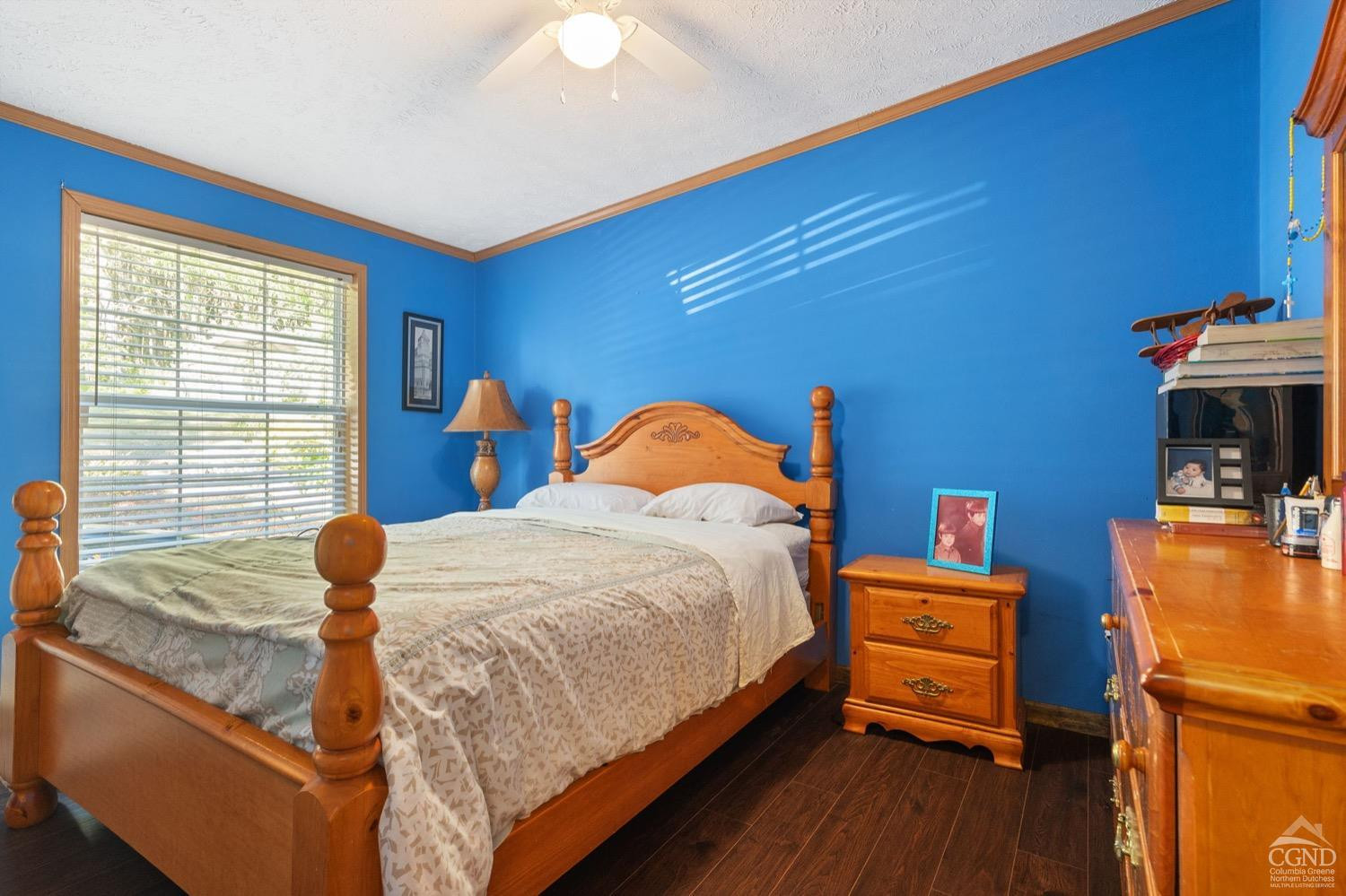 188 Taibbi Road Gilboa, NY 12076 - Photo 30 of 54 a bedroom with a bed and wooden floor