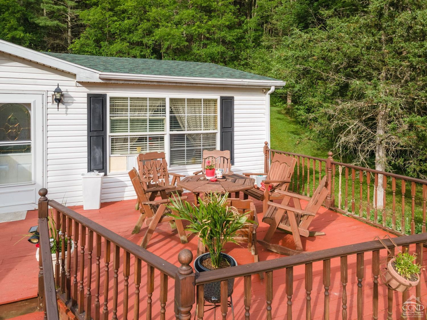 188 Taibbi Road Gilboa, NY 12076 - Photo 3 of 54 a view of a chairs and table in the balcony