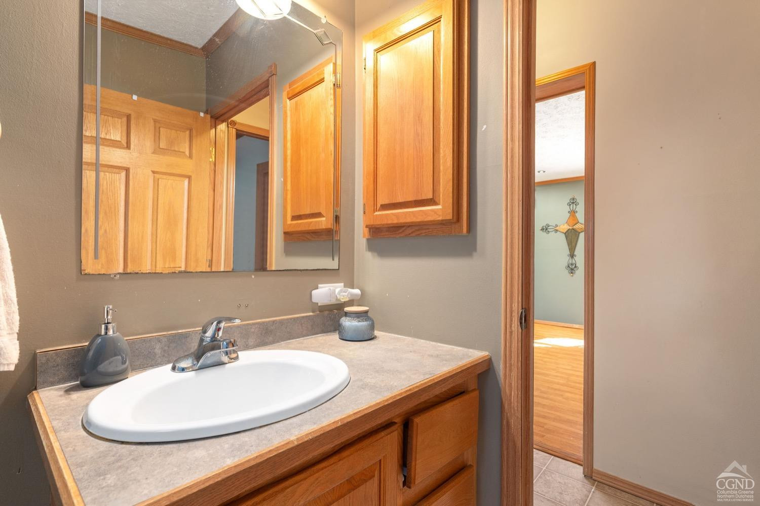 188 Taibbi Road Gilboa, NY 12076 - Photo 31 of 54 a bathroom with a sink and a mirror
