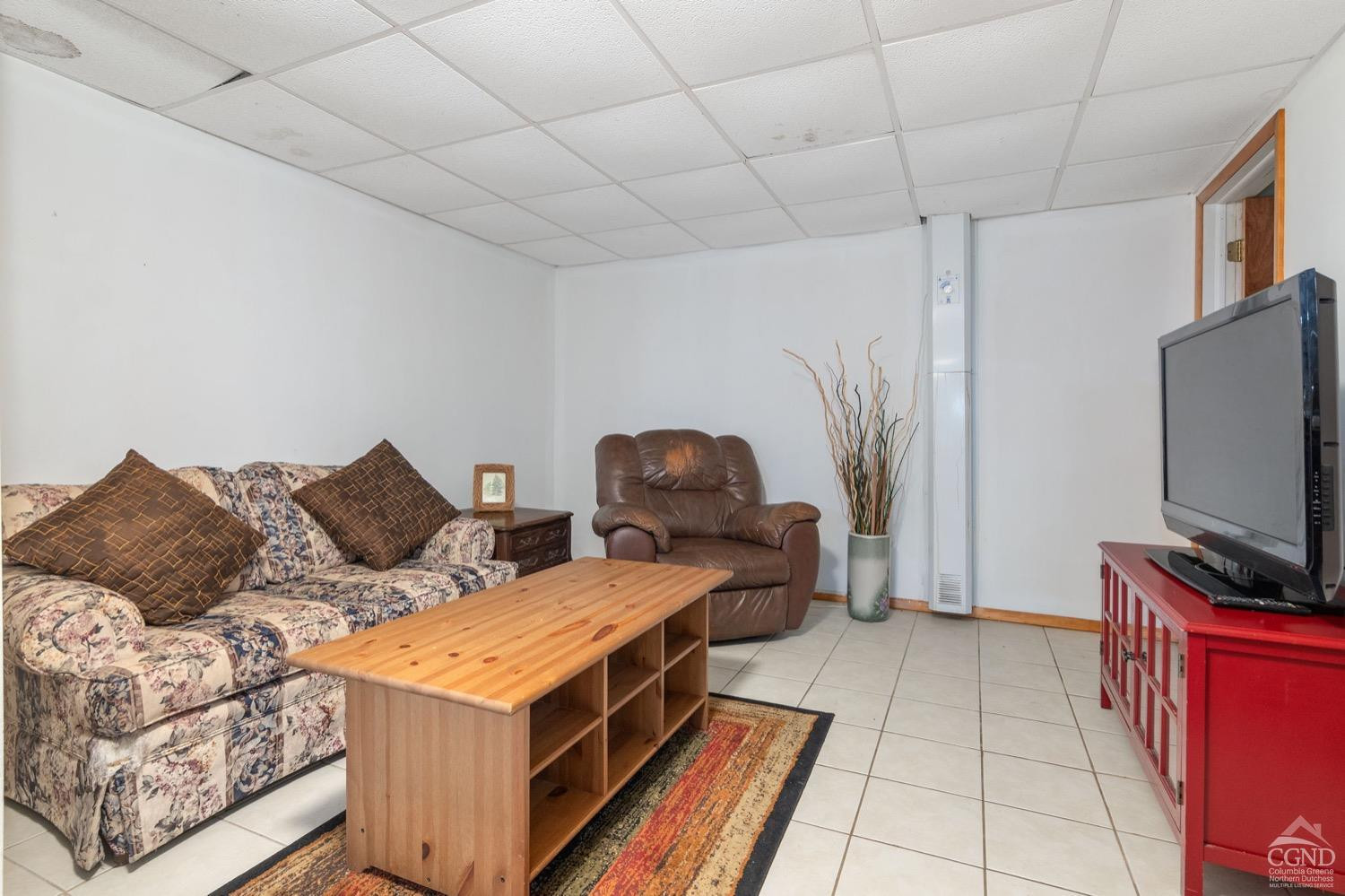 188 Taibbi Road Gilboa, NY 12076 - Photo 37 of 54 a living room with furniture and a flat screen tv