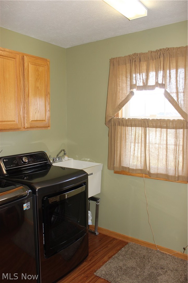 2005 Summerchase Road Northeast Canton, OH 44721 - Photo 14 of 35 Wonderful convenience of a 1st floor Laundry is certainly a must-have! Notice the extra wash tub, and nice window that opens. There is also much more space in the room not pictured.