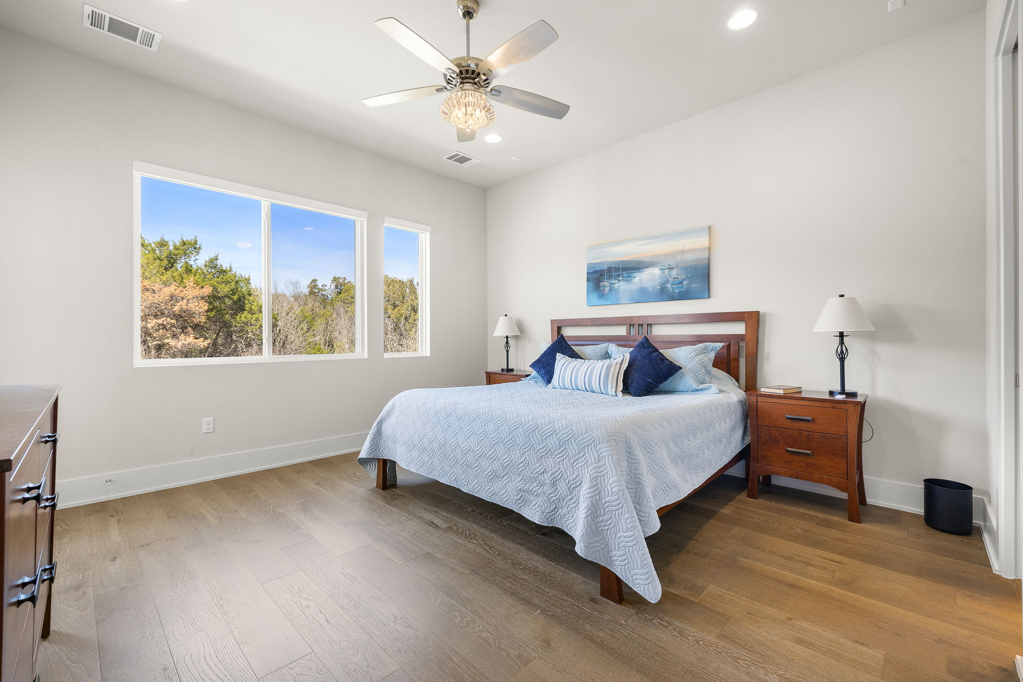 5214 Pink Poppy Pass Austin, TX 78735 - Photo 15 of 34 Bedroom with ceiling fan, light wood-type flooring, and recessed lighting