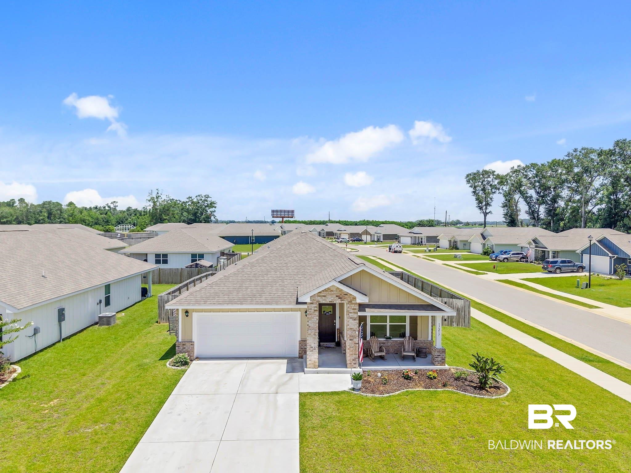 17217 REFLECTION Street Loxley, AL 36551 - Photo 52 of 83 Ranch-style home with a residential view, a garage, driveway, and brick siding
