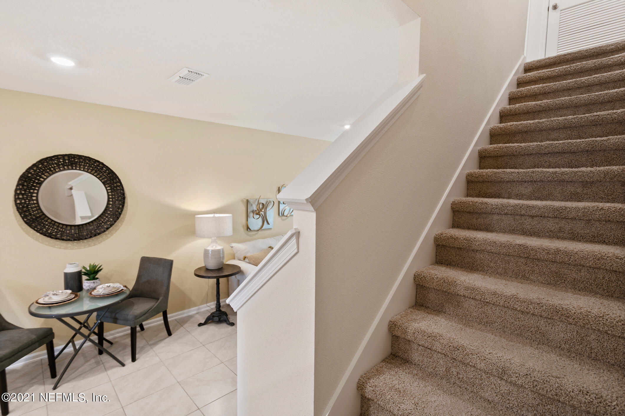 3972 Oak Mill Road Orange Park, FL 32065 - Photo 15 of 24 a view of a livingroom with furniture and a staircase