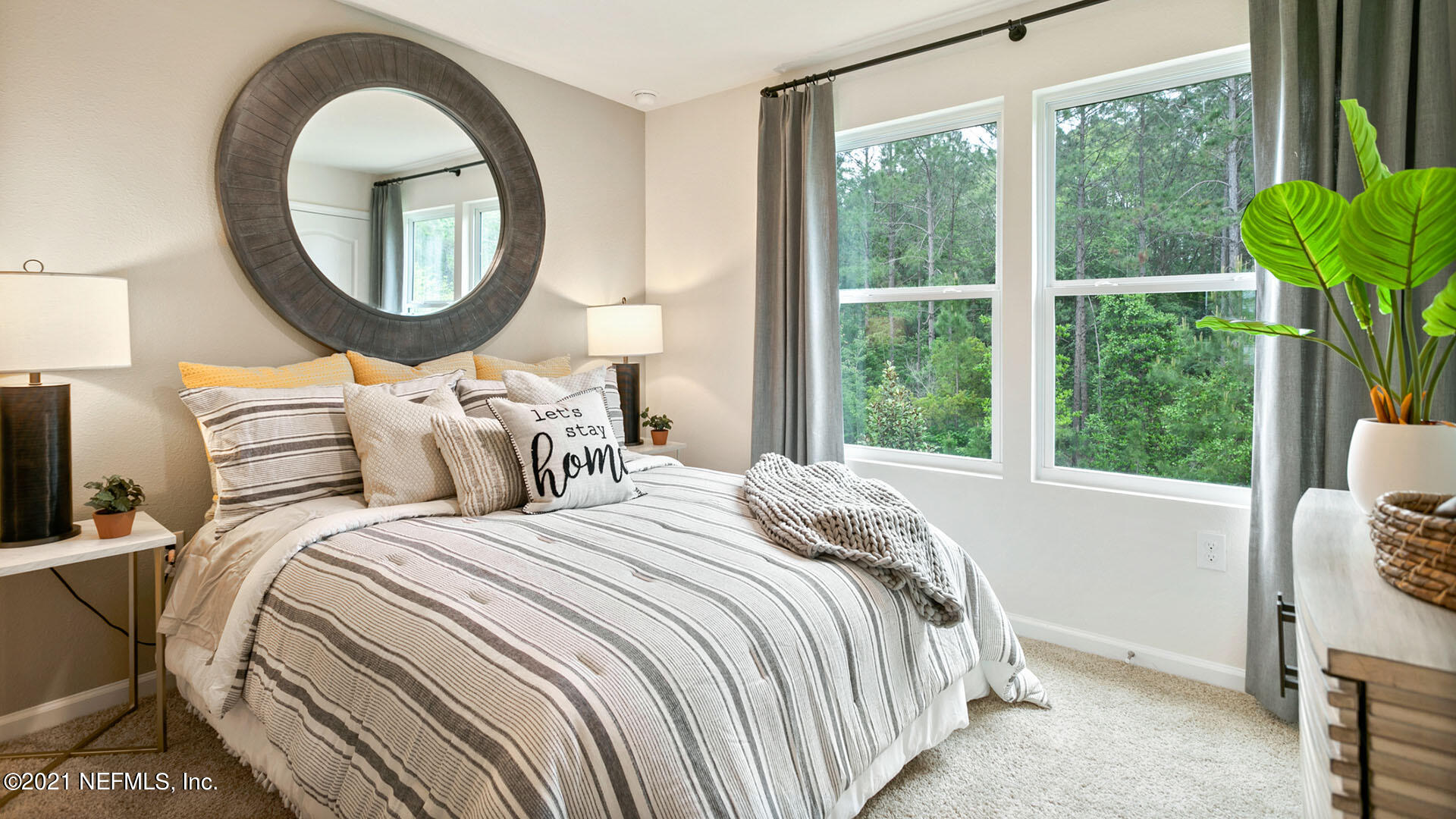 3972 Oak Mill Road Orange Park, FL 32065 - Photo 20 of 24 a bedroom with bed and a window