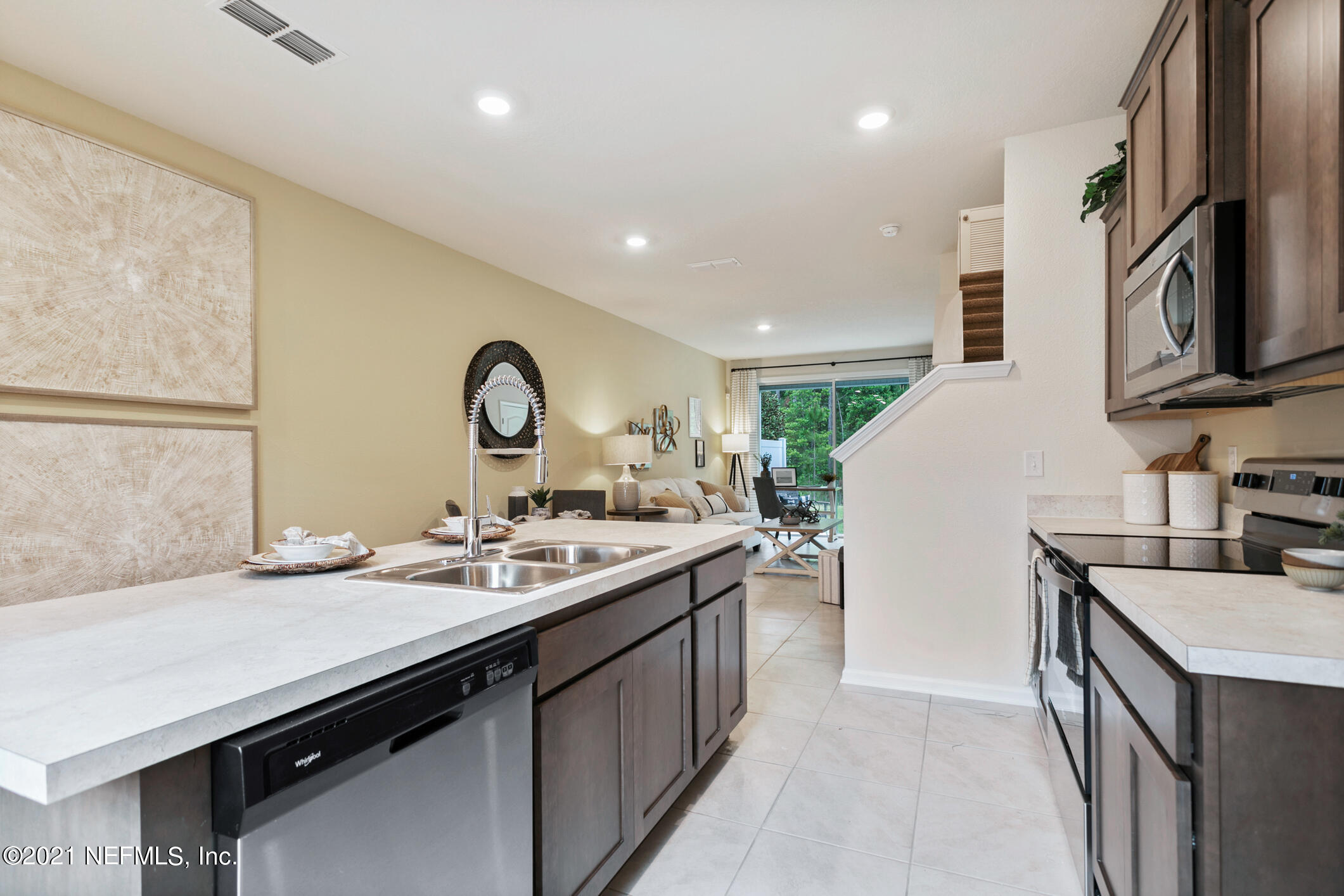 3972 Oak Mill Road Orange Park, FL 32065 - Photo 6 of 24 a bathroom with a sink double vanity and a mirror