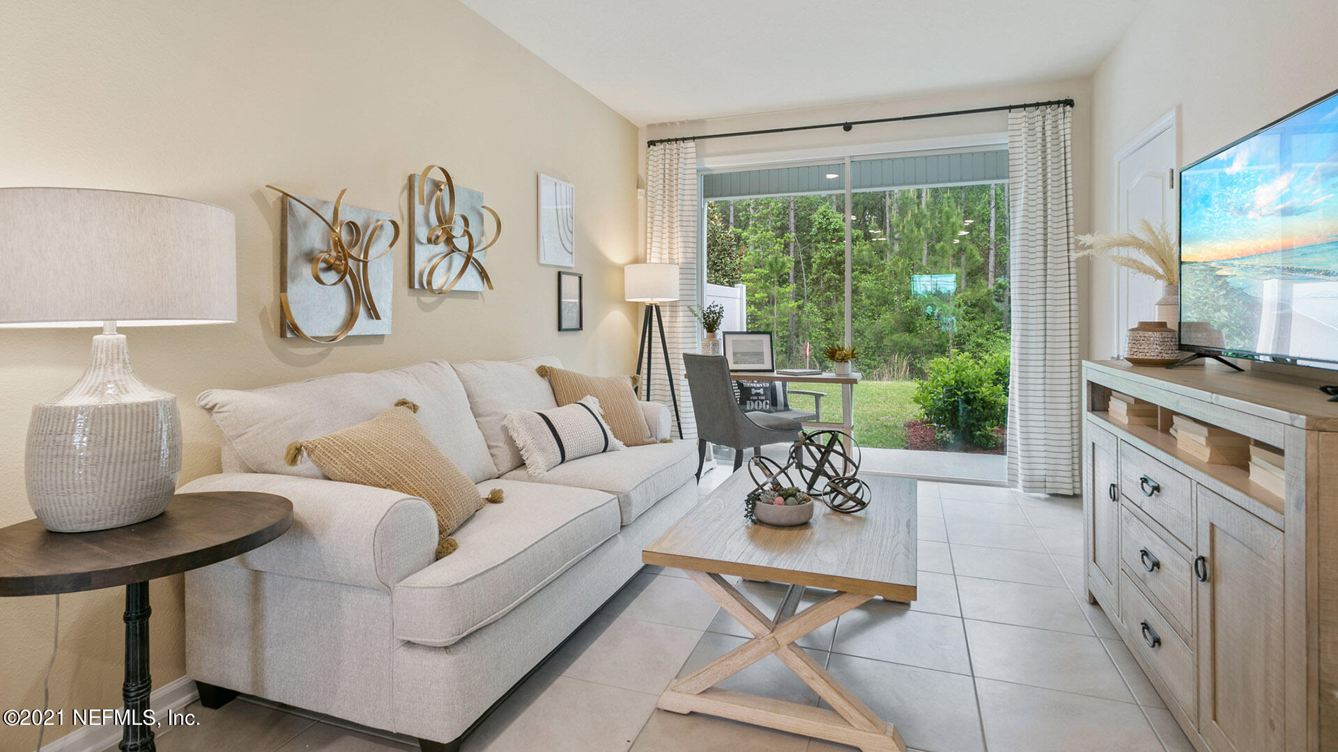 3972 Oak Mill Road Orange Park, FL 32065 - Photo 9 of 24 a living room with furniture and a large window