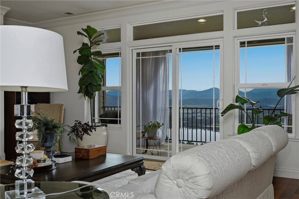 18750 Fernwood Road Hidden Valley Lake, CA 95467 - Photo 11 of 53 a balcony with furniture and potted plants