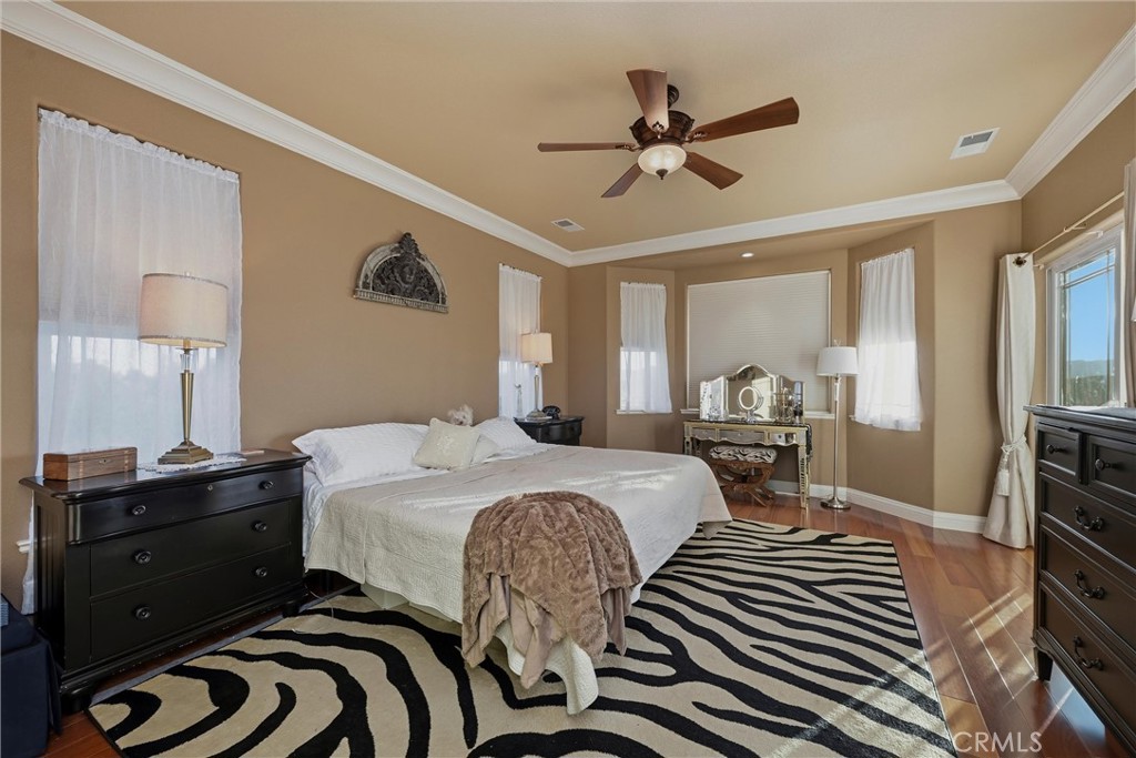 18750 Fernwood Road Hidden Valley Lake, CA 95467 - Photo 30 of 53 a bed room with a bed and a television