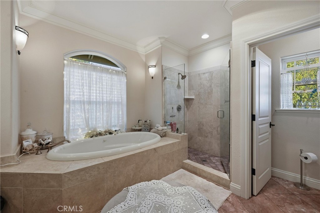 18750 Fernwood Road Hidden Valley Lake, CA 95467 - Photo 34 of 53 a bathroom with a double vanity sink a mirror and a shower