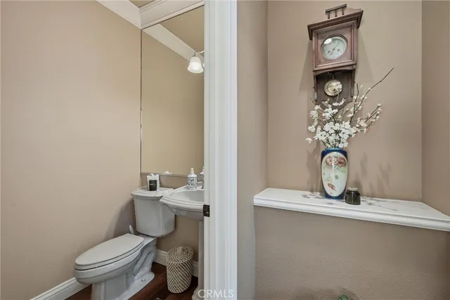 a spacious bedroom with a bed and large windows