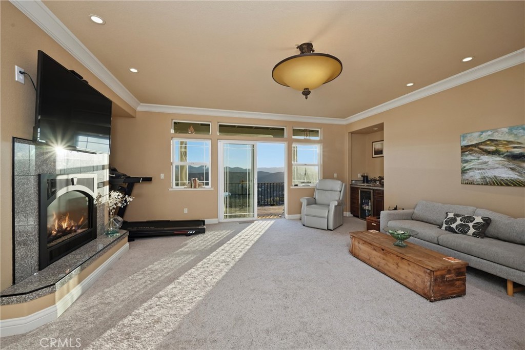 18750 Fernwood Road Hidden Valley Lake, CA 95467 - Photo 38 of 53 a spacious bedroom with a bed and large windows