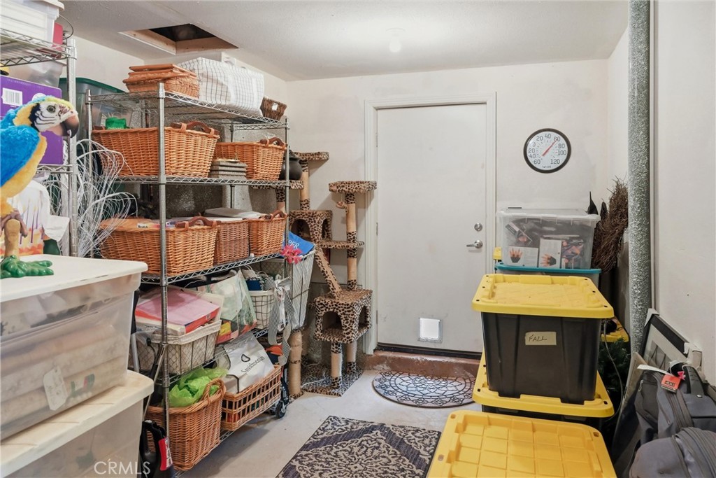 18750 Fernwood Road Hidden Valley Lake, CA 95467 - Photo 45 of 53 a room with storage and a table