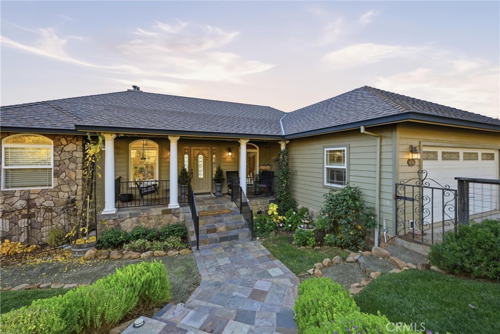 18750 Fernwood Road Hidden Valley Lake, CA 95467 - Photo 7 of 53 a view of a house with porch and garden
