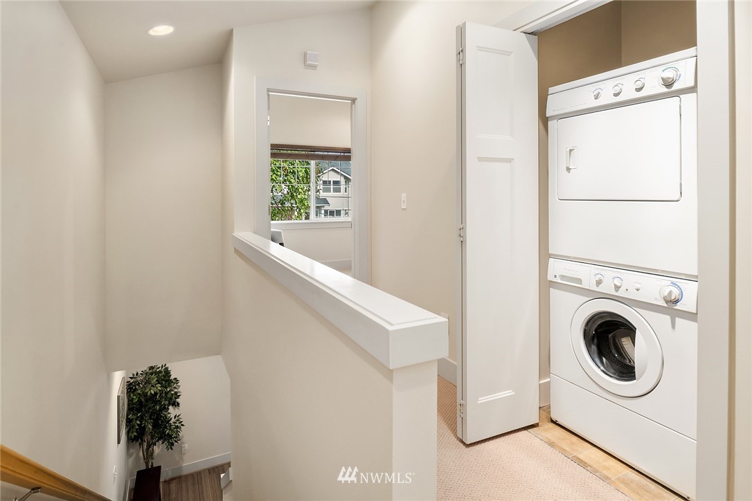723 North 95th Street, Unit B Seattle, WA 98103 - Photo 14 of 24 a utility room with dryer and washer