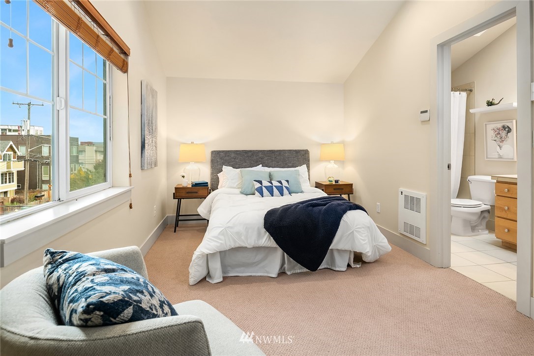 723 North 95th Street, Unit B Seattle, WA 98103 - Photo 18 of 24 a living room with furniture and a large window