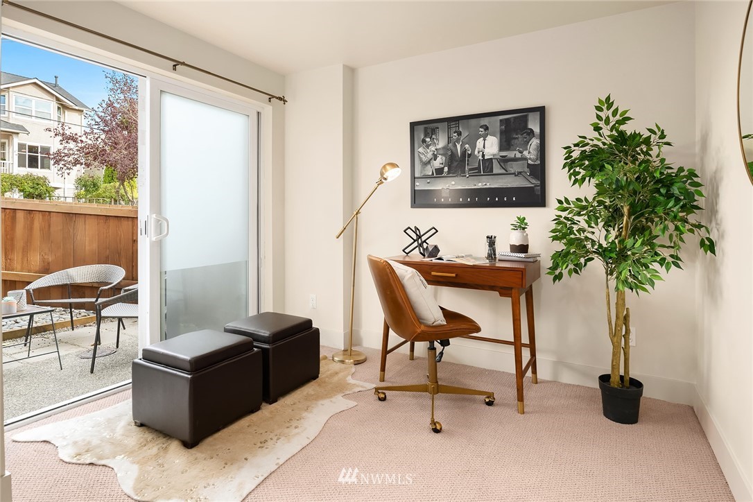 723 North 95th Street, Unit B Seattle, WA 98103 - Photo 7 of 24 a living room with furniture and a potted plant
